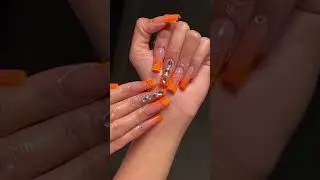 Charming french manicure nails with orange tips #nailart #christmasnails