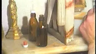 Fr Joseph Malouil collecting the oil that oozed from the Icon of Soufanieh