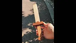 Sneaking a play with my nephew&rsquo;s wooden sword while he&rsquo;s away.