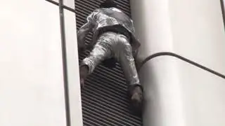 'French Spiderman' Alain Robert climbs the Deutsche Bahn tower in Frankfurt