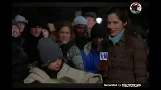 Elf (2003)- Micheal shows the crowd that Santa is real via Santa's book scene