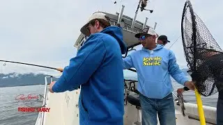 Jacob's 1st fish. Gary allows his secondary cameraman to land his first fish with the Buzzbomb crew