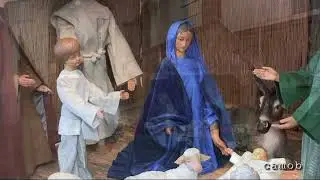 6885 Vier periodes van kerststallen in de Sint-Barbarakerk./SFKERST