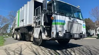 White Gmc Wxll Leach Beta Rear Loader Roaring On Park Trash