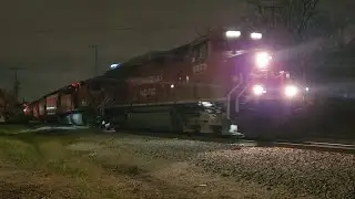 CP 8073 leads CP 249 past Harwood Avenue on Canadian Pacific's Watertown Subdivision|12/21/23