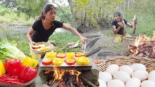 Big fish grilled in the mud is tasty food, Duck egg cooking in bell peppers on rock, Chicken curry