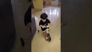 Kenzo rides his first bike