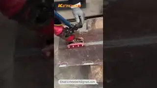 Heat treatment of steel plate welds by handheld mobile induction heating