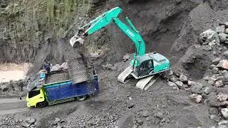 The excavator digs deeper to get maximum sand mining results