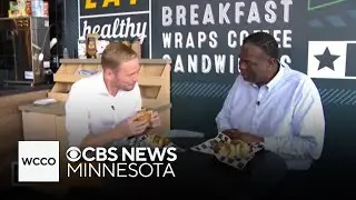 Reg and Adam share a sandwich to celebrate a huge milestone