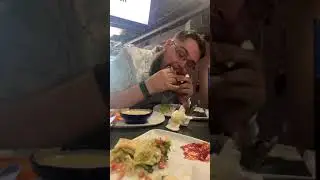 Florida Man Demolishing Jerk Chicken Taco.