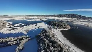 Cerknisko jezero, Cerknica lake. First snow-fairytale view with drone