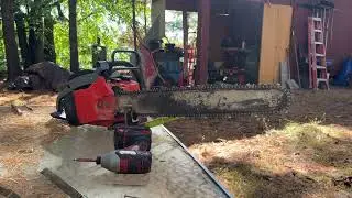 Making lumber from a sunken log. 