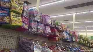 Dollar Tree employee's eyes lock onto the bulge