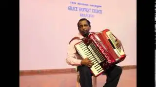 Rev. Dr. G. Allan Roy playing 