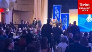 SHOCK MOMENT: Protesters Rush Stage As Charles Koch Accepts Award From The Cato Institute In D.C.
