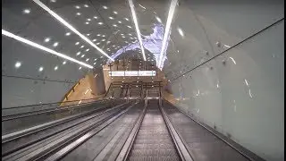 Sweden, Stockholm, Haninge Train Station, escalator ride down to ticket concourse level