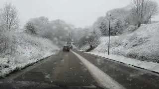 Driving through Dove Holes in the  snow!