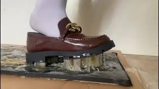 Burgundy penny loafers stuck to Catchmaster Bulk Glue