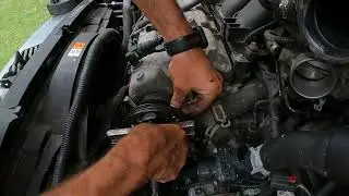 Changing water pump on a mercury Milan or ford 3.0 engine.