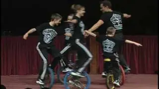 Bruce Crevier and family ride unicycles for First Baptist Jonesboro Roc Basketball Celebration