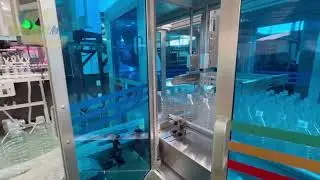 The bottle leak detector is connected to the bottle packaging machine.#bottlebaggingmachine