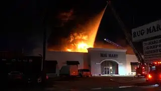 Second alarm tire warehouse fire behind Rug Mart in Southwest Houston
