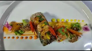 Asian spice Honey lemon marinated oven roasted seabass fish roll with steak seasonally veggies