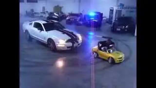 Drifting around yellow Camaro