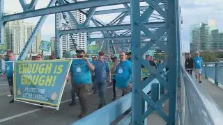 Letter carriers protest against violence in downtown Jacksonville