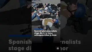Spanish journalists stage die-in to honor colleagues killed in Gaza