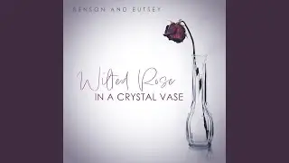 Wilted Rose in a Crystal Vase