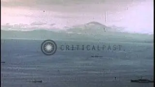 Invasion fleet underway in Tokyo Bay and US Navy dive bomber aircraft SB2C Helldi...HD Stock Footage