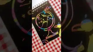 Magical globe drawing on scratch note book