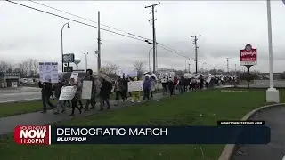 Democrats march through rain in Bluffton protest
