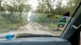 Driving in the gigantic mud pools inside the rainforest - Bolivia's Amazon region - September 2019.