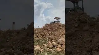 Good job mini Dozer pushing clearing Stone
