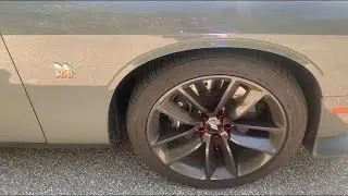 Swapping my lug nuts out for red spike lugs on my scatpack challenger ‼️🔥