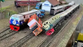 A long-distance train, the CC206 Commuter Line, derailed after hitting an Indonesian postal box t...