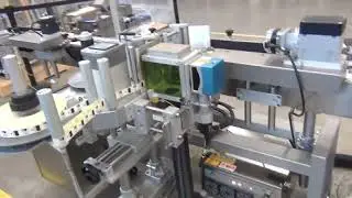 Wrap around labeling system with fiber laser embedded