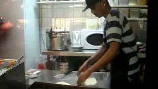 making roti canai - origins of Roti King, Euston