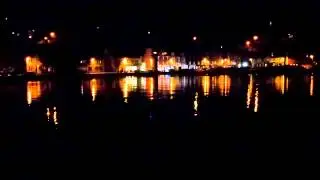 Derek McGeehan In his Mini WRC on Tobermory Harbour