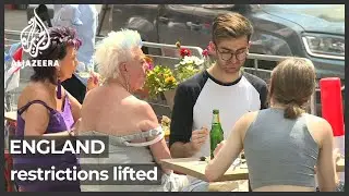 Mixed feelings as England lifts most COVID restrictions