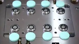 Multi-cavity plastic injection mold with unscrewing unit