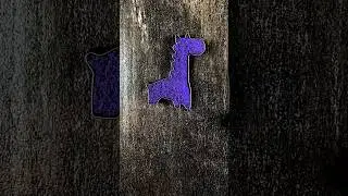 A Giraffe Was Made from Kinetic Sand in the Shape of a Square