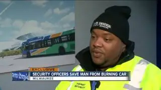 Transit officers pull man from burning car