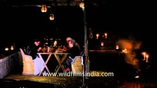 Visitors dining under the open sky at Kanha Earth Lodge