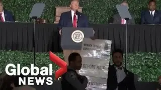 Donald Trump interrupted by protesters during event in Virginia
