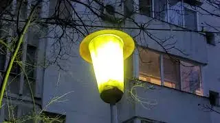 Vintage Elba PVT streetlight with 250W high pressure sodium lamp turning on