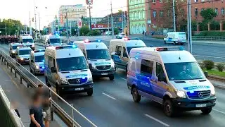 Football fans with massive police escort